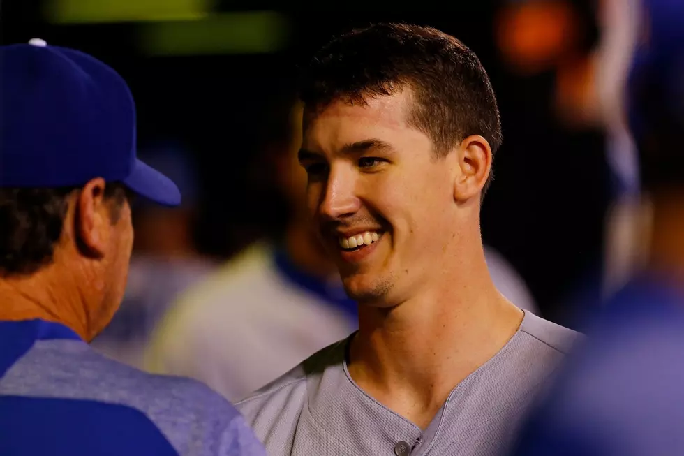 Buehler, Dodgers blank Cards to draw even in wild-card race